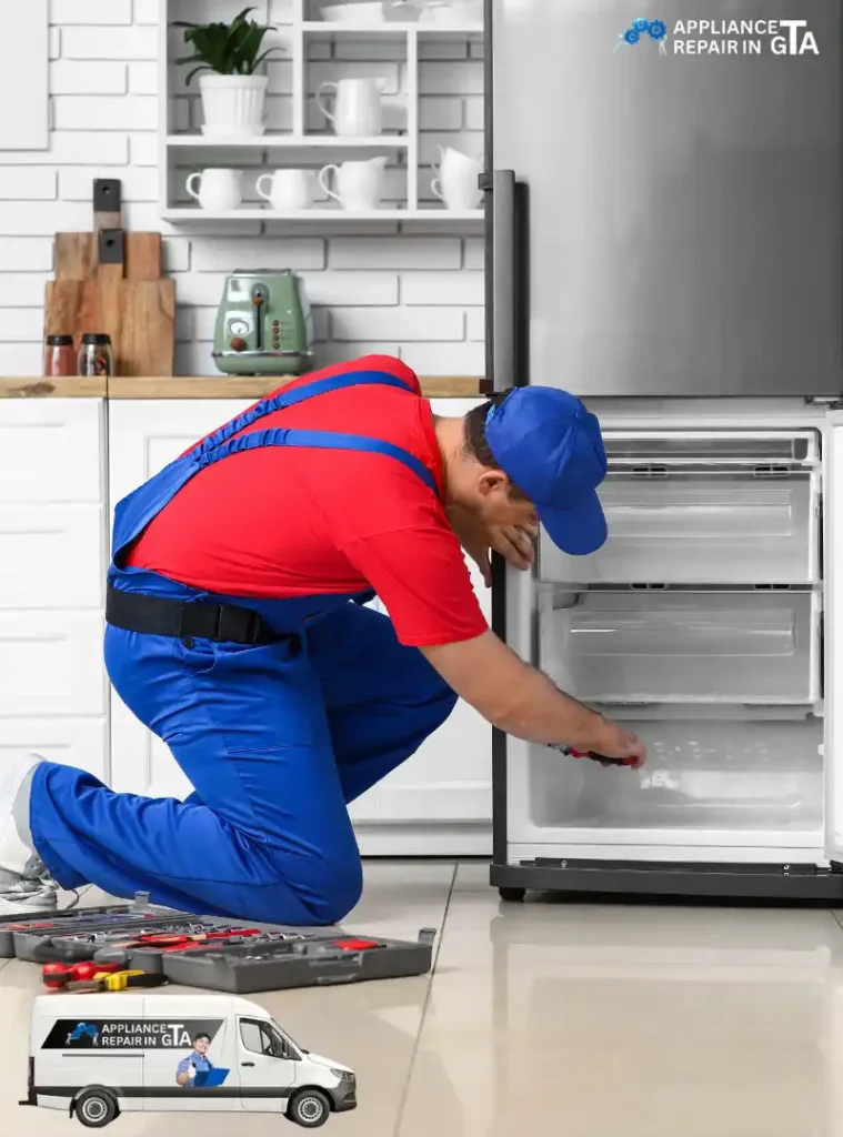 Appliance Repair in North York technician fixing a freezer – Appliance Repair in GTA